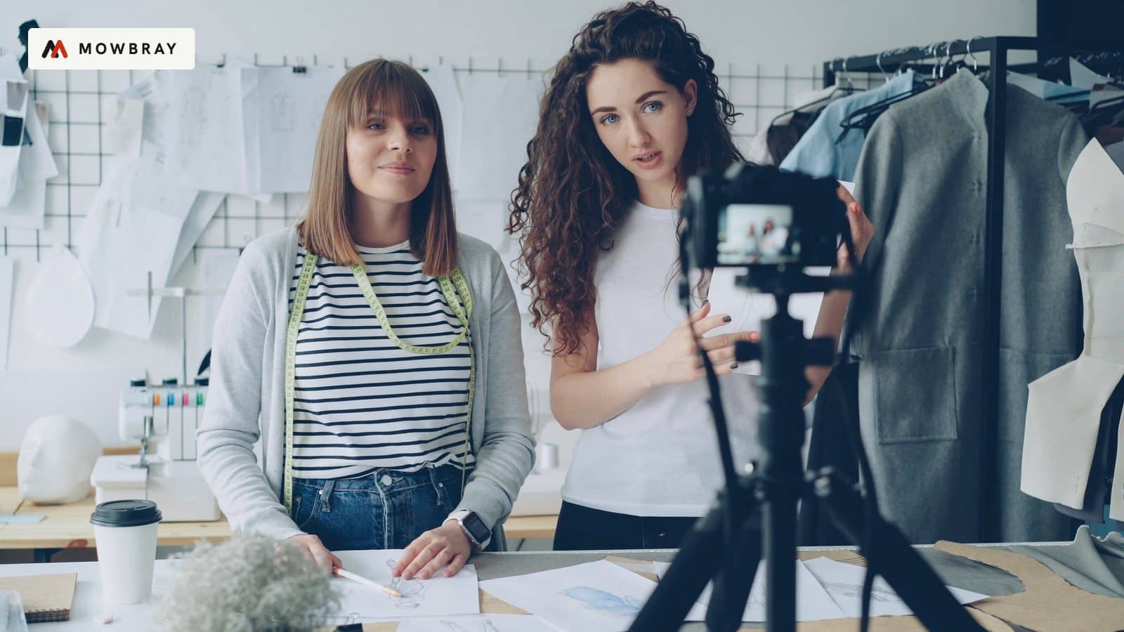 Two young founders filming a product video in their studio